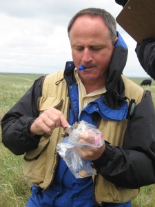 Paul Stapp handles a thirteen-lined ground squirrel, one of the most common small mammal species in shortgrass steppe at the Central Plains Experimental Range.